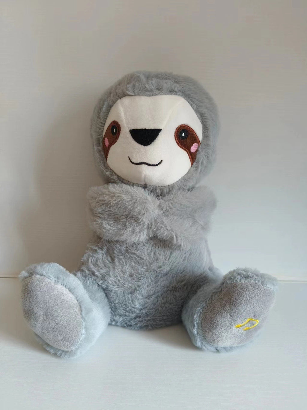 Máquina de sonido Lontra Acurrúcate y Tranquiliza Juguete de peluche portátil para bebé con detalles sensoriales música luces y movimiento rítmico de respiración