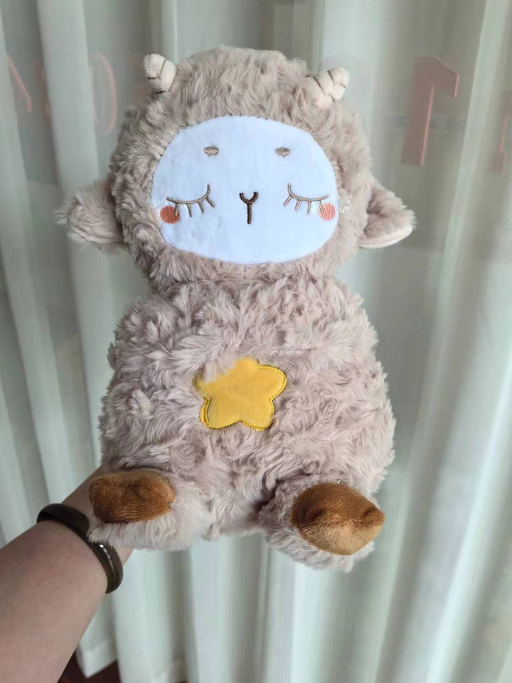 Máquina de sonido Lontra Acurrúcate y Tranquiliza Juguete de peluche portátil para bebé con detalles sensoriales música luces y movimiento rítmico de respiración