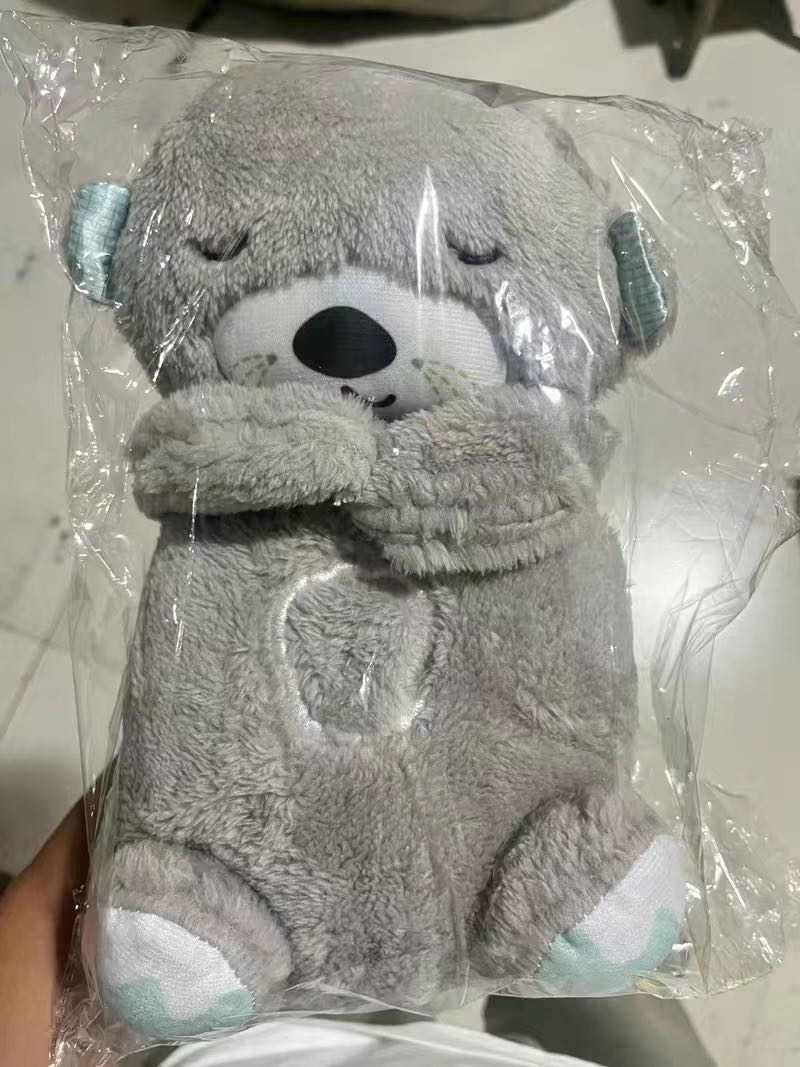 Máquina de sonido Lontra Acurrúcate y Tranquiliza Juguete de peluche portátil para bebé con detalles sensoriales música luces y movimiento rítmico de respiración